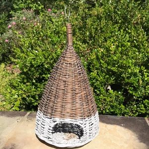 Woven bird nesting basket.15 1/2” tall with hook. Base is 8” diameter.